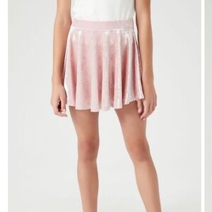 Two pack of forever 21 velvet mini skirts.